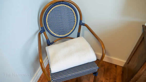 image: antique chair with blue fabric