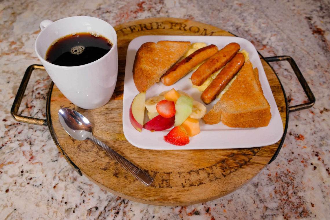 image: breakfast sausage, fruit and toast